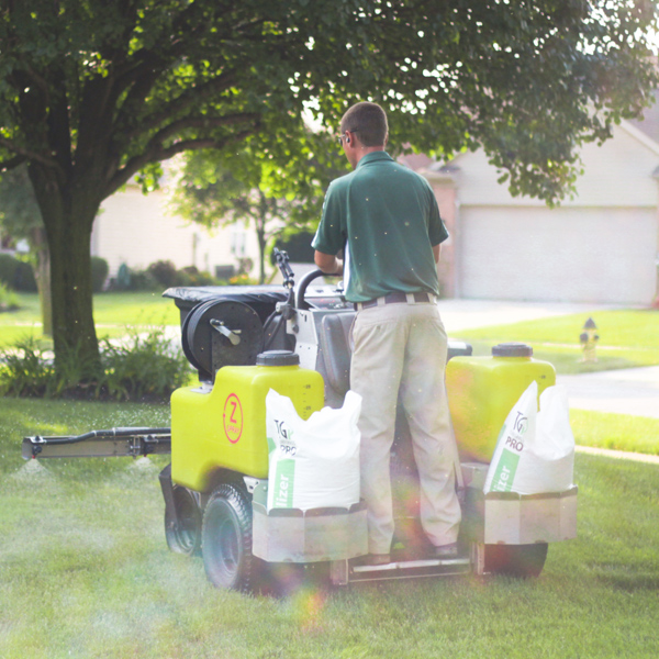 technician on spreader